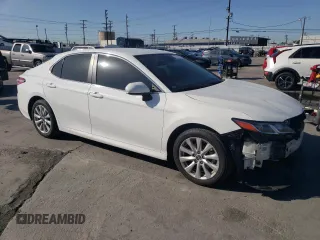 2020 Toyota Camry LE with VIN 4T1C11AK5LU944417, listed as a Copart auction lot 47455145 with 52,562 mi miles and Salvage Title. Bid and sale history available at DreamBid. Image 4.