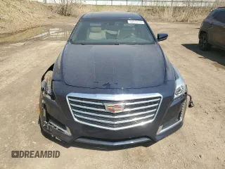 2019 Cadillac CTS Luxury AWD z VIN 1G6AX5SS1K0101825, wystawiony jako Copart lot #52970115 z przebiegiem 56 886 mil mil oraz Czysty tytuł • Clean title. Historia ofert i sprzedaży dostępna na DreamBid. Obrazek 5.
