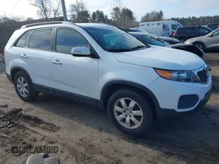 2012 Kia Sorento LX with VIN 5XYKT4A2XCG242557, listed as a IAAI auction lot 41802774 with 117,993 mi miles. Bid and sale history available at carsss.com. Image 1.