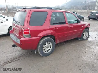 2005 Mercury Mariner Luxury with VIN 4M2YU57145DJ07713, listed as a IAAI auction lot 41678767 with 71,981 mi miles. Bid and sale history available at carsss.com. Image 4.