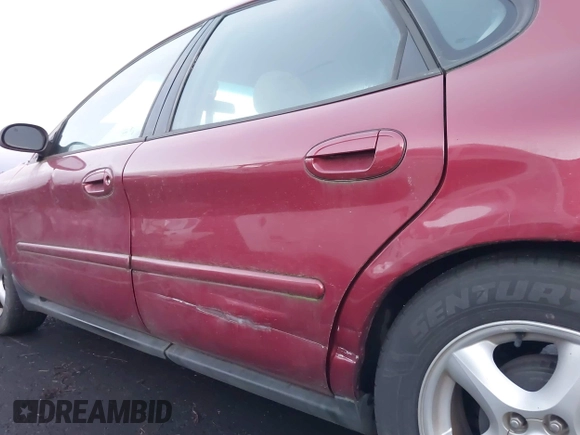 2002 Ford Taurus SE Standard z VIN 1FAFP53U32G242170, wystawiony jako IAAI lot #41299039 z przebiegiem 99 928 mil mil oraz . Historia ofert i sprzedaży dostępna na DreamBid. Obrazek 6.