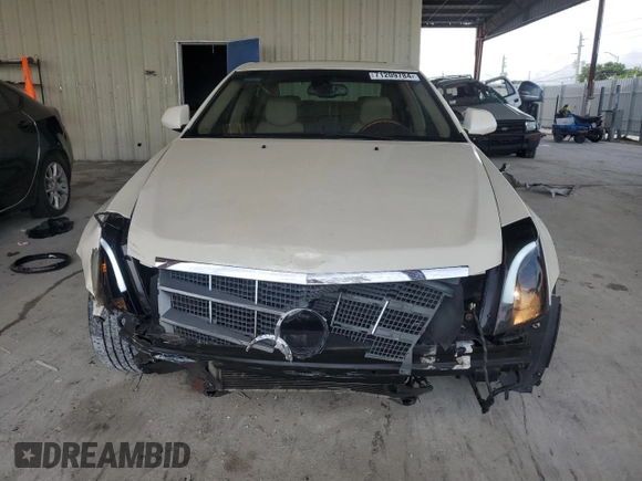 2009 Cadillac CTS AWD w/1SB with VIN 1G6DT57V990151233, listed as a Copart auction lot 71209784 with 96,260 mi miles and Non Repairable. Bid and sale history available at carsss.com. Image 5.