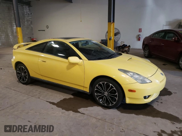 2003 Toyota Celica GT with VIN JTDDR32T930150872, listed as a Copart auction lot 76353954 with 129,294 mi miles and Salvage Title. Bid and sale history available at carsss.com. Image 4.