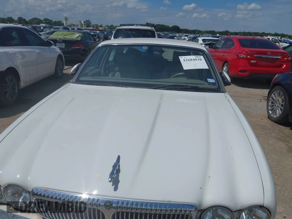 2003 Jaguar XJ 8 with VIN SAJDA14C03LF52338, listed as a IAAI auction lot 42684038 with 142,107 mi miles and . Bid and sale history available at DreamBid. Image 6.