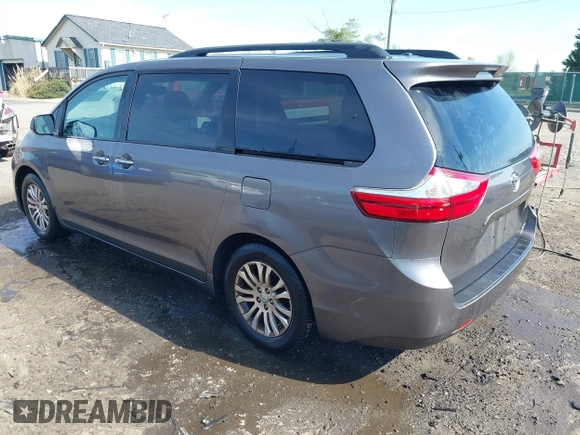 2015 Toyota Sienna XLE with VIN 5TDYK3DC9FS685768, listed as a IAAI auction lot 42062942 with 132,242 mi miles. Bid and sale history available at carsss.com. Image 3.
