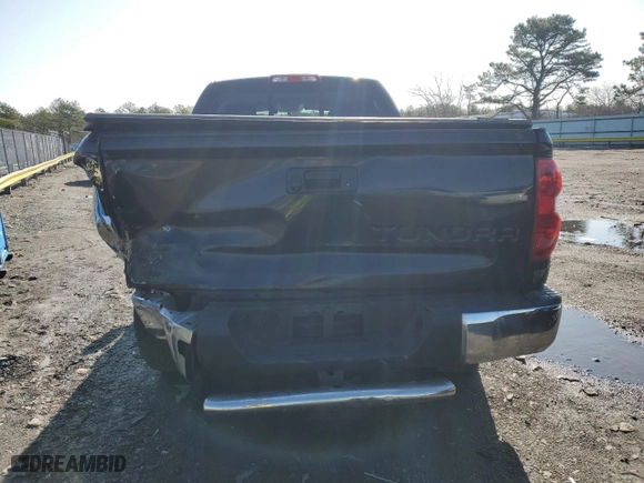2014 Toyota Tundra 4WD Truck SR with VIN 5TFUY5F16EX371055, listed as a Copart auction lot 51045785 with 129,697 mi miles and Salvage Title. Bid and sale history available at carsss.com. Image 6.