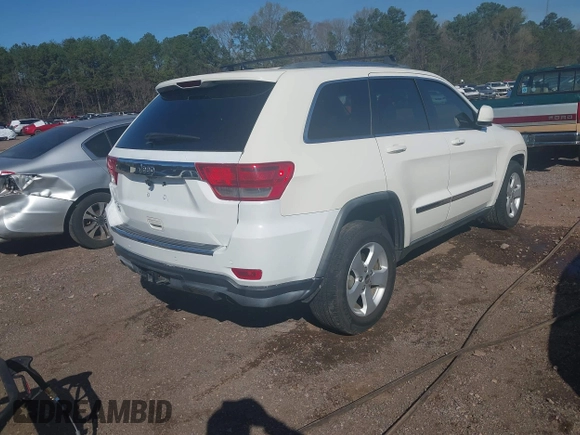 2012 Jeep Grand Cherokee Laredo with VIN 1C4RJEAG5CC106203, listed as a IAAI auction lot 41821138 with 157,474 mi miles. Bid and sale history available at carsss.com. Image 4.