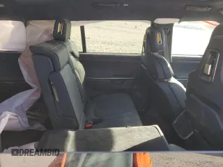 2025 Rivian R1S Adventure z VIN 7PDSGBBA5SN045424, wystawiony jako Copart lot #49675655 z przebiegiem Nie podano mil oraz Szkoda całkowita • Salvage title. Historia ofert i sprzedaży dostępna na DreamBid. Obrazek 11.