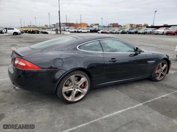 2013 Jaguar XK with VIN SAJWA4DC6DMB50779, listed as a Copart auction lot 50687705 with 106,826 mi miles and Clean Title. Bid and sale history available at carsss.com. Image 3.