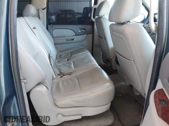 2009 Chevrolet Suburban LTZ with VIN 1GNFC36J29R293712, listed as a IAAI auction lot 42577800 with 202,593 mi miles and . Bid and sale history available at DreamBid. Image 8.