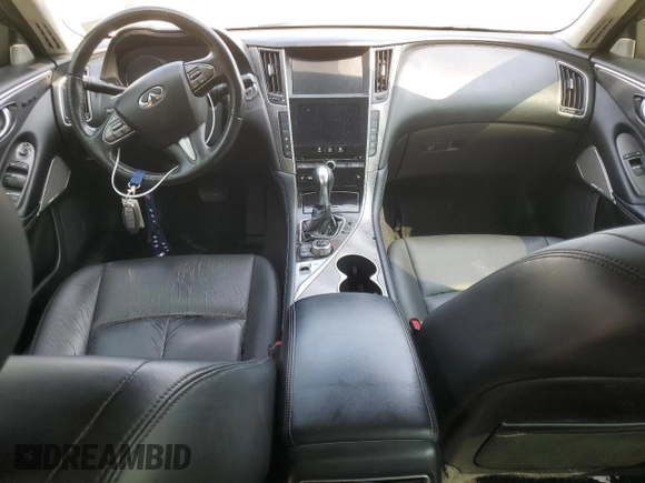 2017 Infiniti Q50 Premium z VIN JN1EV7AP1HM734018, wystawiony jako Copart lot #59952405 z przebiegiem 101 472 mil mil oraz Szkoda całkowita • Salvage title. Historia ofert i sprzedaży dostępna na DreamBid. Obrazek 8.