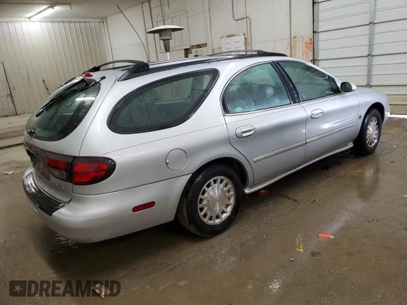 1999 Mercury Sable with VIN 1MEFM58S6XA647250, listed as a Copart auction lot 83479674 with 166,550 mi miles and Salvage title. Bid and sale history available at DreamBid. Image 3.