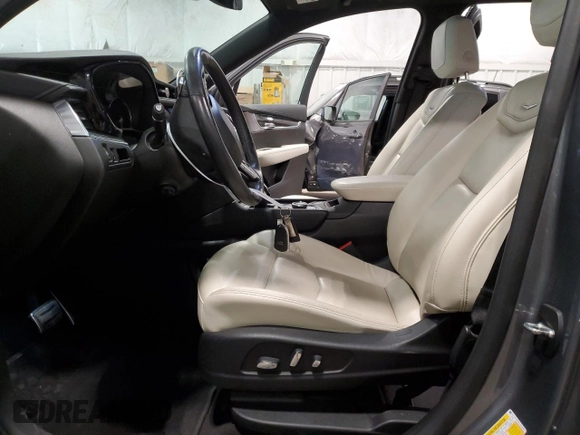 2020 Cadillac XT6 AWD Sport with VIN 1GYKPGRS5LZ145966, listed as a Copart auction lot 66585334 with 76,735 mi miles and Salvage Title. Bid and sale history available at carsss.com. Image 7.