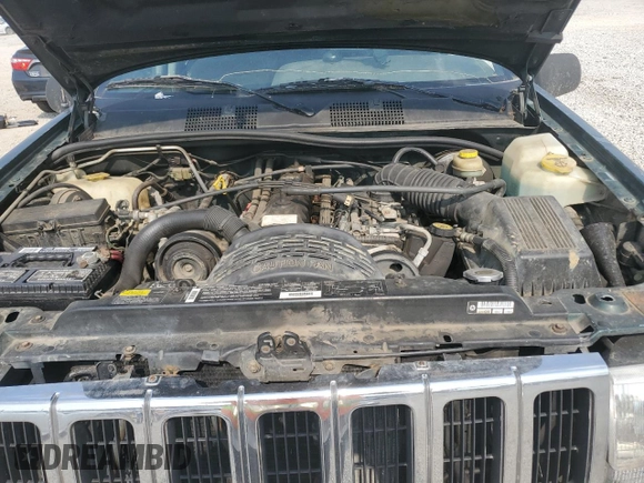1997 Jeep Grand Cherokee Laredo with VIN 1J4GZ58SXVC595012, listed as a Copart auction lot 59746655 with Not provided miles and Salvage title. Bid and sale history available at DreamBid. Image 12.