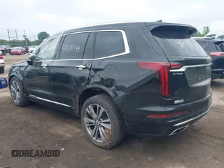 2020 Cadillac XT6 FWD Premium Luxury z VIN 1GYKPCRS6LZ148058, wystawiony jako IAAI lot #42416949 z przebiegiem 79 318 mil mil oraz . Historia ofert i sprzedaży dostępna na DreamBid. Obrazek 3.