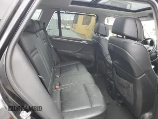 2012 BMW X5 35i z VIN 5UXZV4C5XCL752071, wystawiony jako Copart lot #56623145 z przebiegiem 180 161 mil mil oraz Czysty tytuł • Clean title. Historia ofert i sprzedaży dostępna na DreamBid. Obrazek 11.