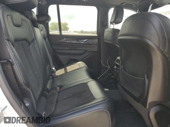 2023 Jeep Grand Cherokee Laredo z VIN 1C4RJGAGXPC552901, wystawiony jako Copart lot #60107115 z przebiegiem 44 231 mil mil oraz Szkoda całkowita • Salvage title. Historia ofert i sprzedaży dostępna na DreamBid. Obrazek 10.