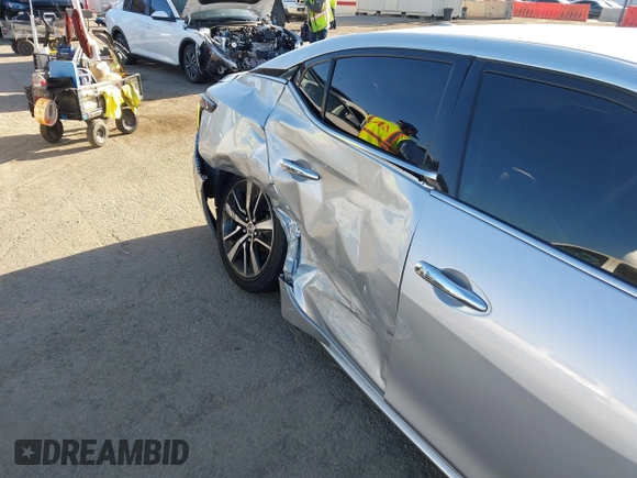 2021 Nissan Maxima SV with VIN 1N4AA6CV7MC512294, listed as a IAAI auction lot 42243607 with 87,803 mi miles and . Bid and sale history available at DreamBid. Image 6.