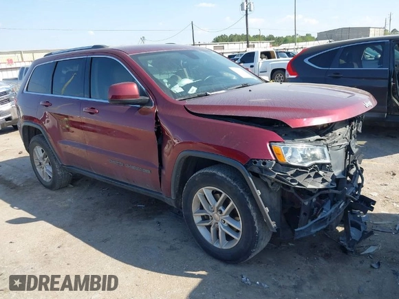 2017 Jeep Grand Cherokee Laredo with VIN 1C4RJEAG4HC674921, listed as a IAAI auction lot 41876971 with 115,773 mi miles. Bid and sale history available at carsss.com. Image 1.