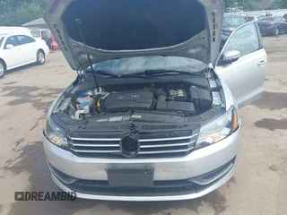 2014 Volkswagen Passat SE with VIN 1VWBT7A37EC039074, listed as a IAAI auction lot 42439583 with 109,654 mi miles and . Bid and sale history available at DreamBid. Image 10.