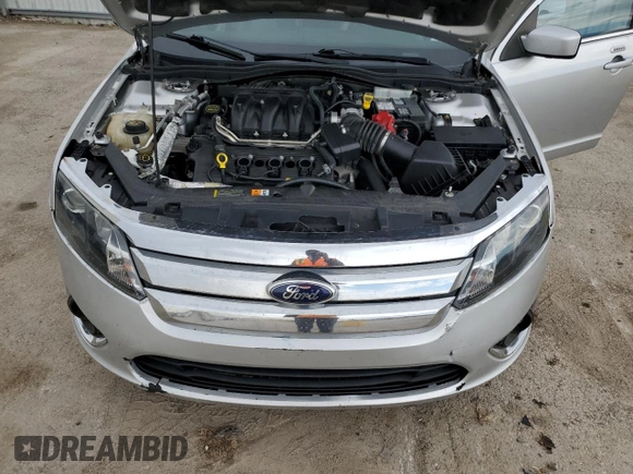 2012 Ford Fusion SEL with VIN 3FAHP0JG1CR434397, listed as a Copart auction lot 50779895 with 99,853 mi miles and Salvage title. Bid and sale history available at DreamBid. Image 12.