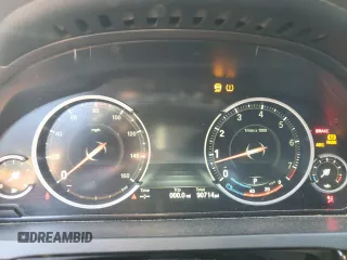 2015 BMW 7 Series 740Li with VIN WBAYE4C51FD947047, listed as a Copart auction lot 86773284 with 90,714 mi miles and Salvage Title. Bid and sale history available at DreamBid. Image 9.