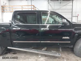 2015 Chevrolet Silverado 1500 High Country with VIN 3GCUKTEJXFG290752, listed as a IAAI auction lot 41412988 with 160,000 mi miles. Bid and sale history available at carsss.com. Image 14.