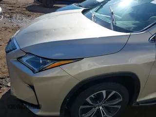 2018 Lexus RX with VIN JTJGZKCA2J2000394, listed as a IAAI auction lot 41400234 with 7,940 mi miles. Bid and sale history available at carsss.com. Image 6.