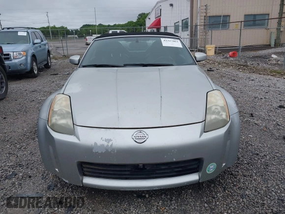 2005 Nissan 350Z Touring z VIN JN1AZ36A25M759800, wystawiony jako IAAI lot #42327063 z przebiegiem 100 940 mil mil oraz . Historia ofert i sprzedaży dostępna na DreamBid. Obrazek 6.
