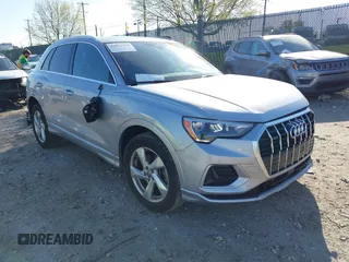2020 Audi Q3 Premium z VIN WA1AECF39L1006221, wystawiony jako IAAI lot #42073138 z przebiegiem 61 788 mil mil oraz . Historia ofert i sprzedaży dostępna na DreamBid. Obrazek 1.