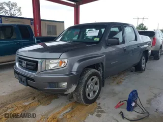 2009 Honda Ridgeline RT with VIN 2HJYK16279H501015, listed as a IAAI auction lot 41996301 with 124,716 mi miles. Bid and sale history available at carsss.com. Image 17.