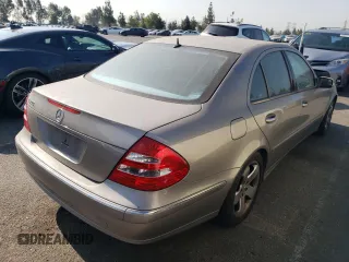 2005 Mercedes-Benz E 5.0L with VIN WDBUF70J75A693702, listed as a Copart auction lot 63497604 with 122,410 mi miles and Clean Title. Bid and sale history available at carsss.com. Image 3.