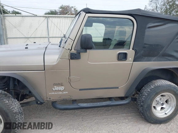 2003 Jeep Wrangler SE with VIN 1J4FA29113P304250, listed as a IAAI auction lot 40917099 with 191,589 mi miles. Bid and sale history available at carsss.com. Image 14.