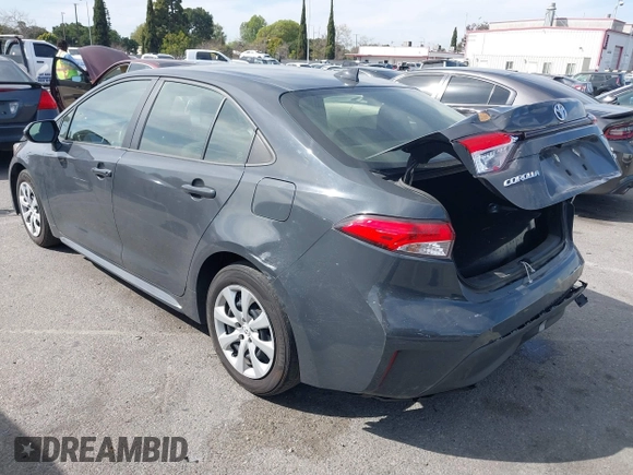 2023 Toyota Corolla Hybrid LE with VIN JTDBCMFE8P3023738, listed as a IAAI auction lot 41765597 with 59,938 mi miles. Bid and sale history available at carsss.com. Image 3.