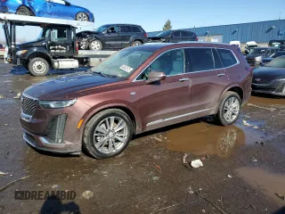 2023 Cadillac XT6 AWD Premium Luxury with VIN 1GYKPDRS0PZ112068, listed as a Copart auction lot 46538575 with 52,016 mi miles and Salvage Title. Bid and sale history available at carsss.com. Image 1.