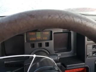 1987 Chevrolet Corvette z VIN 1G1YY3189H5124079, wystawiony jako Copart lot #77180974 z przebiegiem Nie podano mil oraz Szkoda całkowita • Salvage title. Historia ofert i sprzedaży dostępna na DreamBid. Obrazek 9.