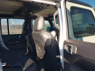 2019 Jeep Wrangler Unlimited Sahara with VIN 1C4HJXEN1KW687924, listed as a IAAI auction lot 41082030 with 65,852 mi miles. Bid and sale history available at carsss.com. Image 8.