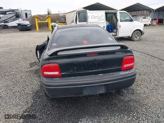 1999 Dodge Neon Competition with VIN 1B3ES47C9XD111397, listed as a IAAI auction lot 41702657 with 210,033 mi miles. Bid and sale history available at carsss.com. Image 17.