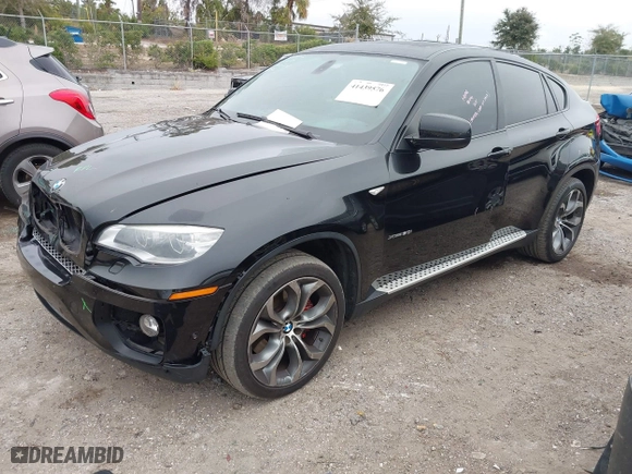 2014 BMW X6 50i with VIN 5UXFG8C54EL593152, listed as a IAAI auction lot 41439576 with 147,817 mi miles. Bid and sale history available at carsss.com. Image 2.
