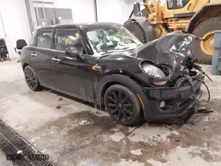 2017 MINI Hardtop 4 Door Cooper with VIN WMWXU1C34H2F78228, listed as a IAAI auction lot 41549060 with 49,393 mi miles. Bid and sale history available at carsss.com. Image 1.