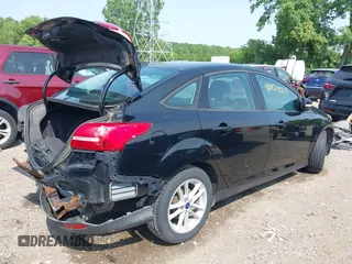 2017 Ford Focus SE with VIN 1FADP3F23HL231305, listed as a IAAI auction lot 42429553 with 110,323 mi miles and . Bid and sale history available at DreamBid. Image 4.