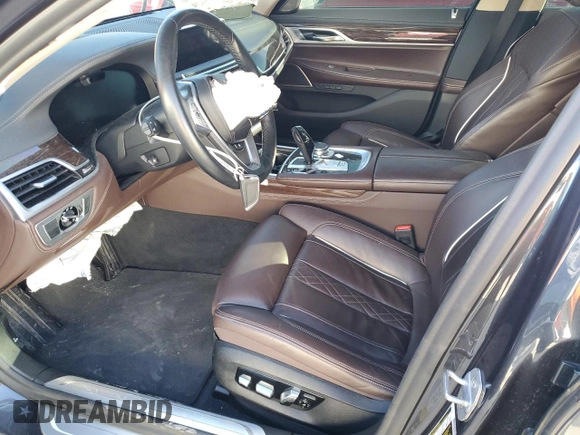 2020 BMW 7 Series 750i xDrive with VIN WBA7U2C05LGM27144, listed as a Copart auction lot 77827854 with 0 mi miles and Salvage Title. Bid and sale history available at carsss.com. Image 7.