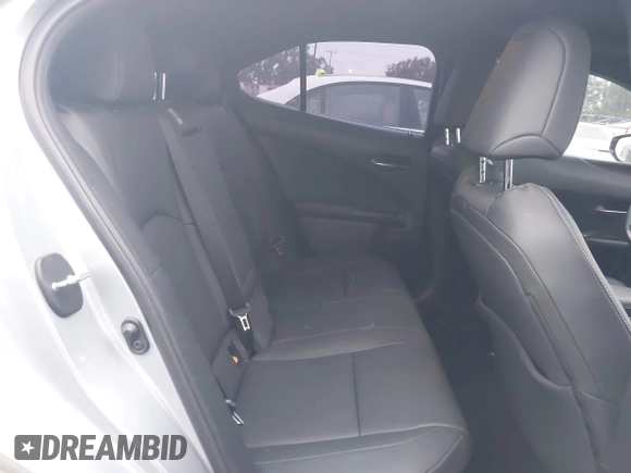 2023 Lexus UX 250h with VIN JTHX6JBH6P2143926, listed as a IAAI auction lot 42180779 with 65,106 mi miles and . Bid and sale history available at DreamBid. Image 8.