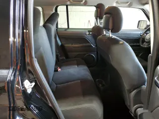 2014 Jeep Patriot Latitude with VIN 1C4NJPFB0ED890696, listed as a Copart auction lot 55581825 with 70,030 mi miles and Salvage title. Bid and sale history available at DreamBid. Image 11.