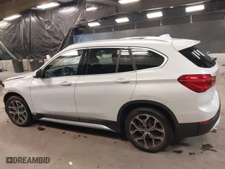 2021 BMW X1 xDrive28i with VIN WBXJG9C0XM5T76975, listed as a IAAI auction lot 41310115 with 26,869 mi miles. Bid and sale history available at carsss.com. Image 15.