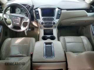 2015 GMC Yukon SLT with VIN 1GKS2BKC6FR585715, listed as a Copart auction lot 47384835 with 0 mi miles and Salvage Title. Bid and sale history available at carsss.com. Image 8.