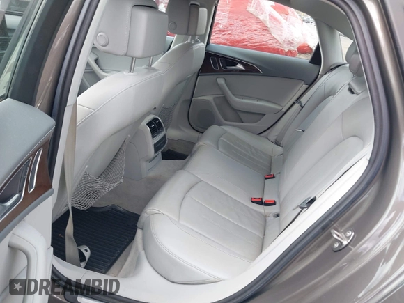 2013 Audi A6 Premium Plus z VIN WAUGGAFC1DN038375, wystawiony jako IAAI lot #42051929 z przebiegiem 118 181 mil mil oraz . Historia ofert i sprzedaży dostępna na DreamBid. Obrazek 8.