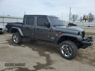 2021 Jeep Gladiator High Altitude с VIN 1C6HJTFGXML600395, выставлен на аукционе Copart как лот 50393625 с пробегом 45 079 миль миль и Списание • Salvage title. История ставок и продаж доступна на DreamBid. Изображение 4.