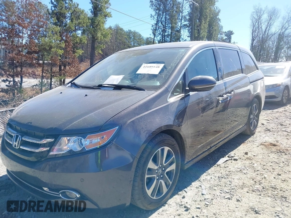 2014 Honda Odyssey Touring with VIN 5FNRL5H92EB016546, listed as a IAAI auction lot 41689148 with 143,601 mi miles and . Bid and sale history available at DreamBid. Image 17.