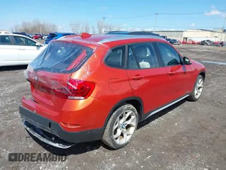 2015 BMW X1 xDrive28i with VIN WBAVL1C57FVY27822, listed as a IAAI auction lot 41977545 with 76,211 mi miles. Bid and sale history available at carsss.com. Image 4.